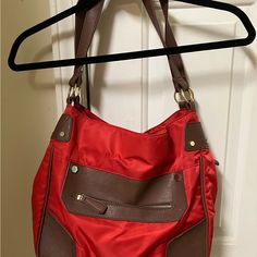 Really Cute! Lots Of Pockets. Measures 15x9 1/2 Total Length Counting Strap 18” Red Double Handle Bag With Pockets, Casual Red Hobo Bag With Zipper Closure, Red Shoulder Bag With Zipper For Travel, Large Capacity Red Hobo Bag For Travel, Red Shoulder Bag With Pockets For Shopping, Red Hobo Bag With Adjustable Strap For Travel, Red Shoulder Bag With Zipper For Shopping, Red Shoulder Bag With Zipper Closure For Shopping, Red Hobo Tote Bag For Travel