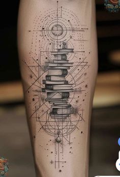 a man's leg with an abstract tattoo design on the side of his leg