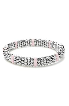 A single band of diamonds enchants this polished bracelet crafted with sterling silver Caviar beading and pink ceramic stations. Exclusive retailer Total diamond weight: 0.01ct. Color: G–H Clarity: I Sterling silver/ceramic/diamond Imported Elegant Pink Stackable Bracelets, Luxury Pink Stackable Jewelry, Elegant Pink Sterling Silver Round Bracelet, Luxury Pink Beaded Bracelets, Pink Rondelle Elegant Jewelry, Elegant Pink Rondelle Jewelry, Pink Rondelle Jewelry, Elegant Pink Sterling Silver Bracelets, Pink Sterling Silver Jubilee Bracelet