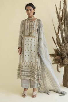 Cream kurta with floral printed motifs and sequin work. Paired with embroidered pant and floral print dupatta.
Component: 3
Printed
Neckline: Round
Sleeve Length: Full
Fabric: Viscose Crepe,Georgette
Color: Beige
Printed dupatta
Front tassel tie-up - Aza Fashions Kurta Set For Women, Georgette Dupatta, White Kurta, Embroidered Pants, Luxury Sale, Indian Fashion Designers, Pernia Pop Up Shop, Kurta Set, Straight Pants