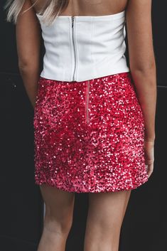 And it's moment it will 100% have!! This sequin mini skirt was made to be the star of the show!! It's so good, you might just need all 6 colors. Velvet and sequins lined mini skirt, high slit on the side, back zipper, skirt has a stretch Material is Polyester Hang to dry Model Katherine is 5'9 wearing a small SHOP THE LOOK X Small Small Medium Large X Large Length 15.5" 16.5" 17.5" 18.5" 19.5" Width 14" 15" 16" 17" 18" Wedding Guest Romper, Party Bottoms, Sequin Mini Skirt, Zipper Skirt, Amazing Lace, Sequin Mini Skirts, Denim Romper, Sequin Mini, Maxi Dress Party