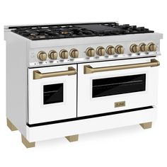 a white stove with two ovens and gold knobs on the front, against a white background