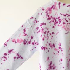 One of a kind, hand-dyed purple and pink splatter tie dye crewneck sweatshirt Unisex size L 50% cotton, 50% polyester Care instructions: Wash separately in cold water. Colors may change over time. Spring Hand-dyed Tie Dye Sweatshirt, Tie Dye Hand Dyed Crew Neck Sweatshirt, Hand Dyed Tie Dye Crew Neck Sweatshirt, Hand Dyed Tie-dye Crew Neck Sweatshirt, Hand-dyed Tie-dye Crew Neck Sweatshirt, Tie Dye Cotton Sweatshirt For Loungewear, Cotton Tie Dye Sweatshirt For Loungewear, Pink Bleached Crew Neck Top, Spring Bleached Sweatshirt In Relaxed Fit