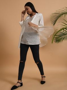 A cotton khadi & chanderi shirt with front placket, 3/4th sleeves, comes with a soft cotton matching slip. Garment measurements (in Inches): Size XS : Bust-34", Waist-36", Hip-Flared Size S : Bust-36", Waist-38", Hip-Flared Size M : Bust-38", Waist-40", Hip-Flared Size L : Bust-40", Waist-42", Hip-Flared Size XL : Bust-42", Waist-44", Hip-Flared Size XXL : Bust-44", Waist-46", Hip-Flared Size 3XL : Bust-46", Waist-48", Hip-Flared Size 4XL : Bust-48", Waist-50", Hip-Flared Length: 30-32", sle Cotton Chikankari Embroidery Long Sleeve Blouse, Casual Cotton Kurta With Half Sleeves, Long Sleeve Cotton Silk Kurta For Summer, Off White Cotton Blouse For Daywear, Summer Long Sleeve Cotton Silk Kurta, Handloom Cotton Kurta For Spring, Diwali Cotton V-neck Sets, Spring Handloom Cotton Kurta, Long Sleeve Cotton Blouse Piece