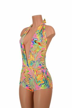 "This item is made to order, please read all the way through the listing before purchasing! This bodysuit is made of super bright neon flux uv glow print spandex! This fabric is beautifully smooth, breathable, very durable, and crazy stretchy. Deep V neckline and tie back halter top. Four way stretch for a figure forming fit. This bodysuit is unlined. Womens Sizing (See below for instructions on where measurements should be taken) XXS: Bust 29\"-30\" / Waist 22\"-23\" / Hips 30\"-32\" Extra Smal Rave Multicolor Bodysuit For Club, Rave Style Multicolor Bodysuit For Club, Pink Summer Unitard, Summer Rave Fitted Unitard, High Stretch Summer Swimming Unitard, High Stretch Unitard For Club In Summer, Green Rave Swimwear, Multicolor Fitted Rave Unitard, Summer Club Unitard