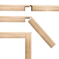 three pieces of wood are arranged in the shape of rectangles