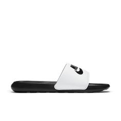 The Nike Victori slipper offers ideal comfort. Features a soft padded strap and a soft foam midsole. Secondary foam on the sole has flex cutouts for added comfort and natural freedom of movement. Size: SZ 7.  Color: White.  Gender: male.  Age Group: adult. Slides Nike, Mens Nike Shoes, 12th Man, Under Armour Men, Sport Man, White Nikes, Slide Slipper, Men's Nike, Black Nikes