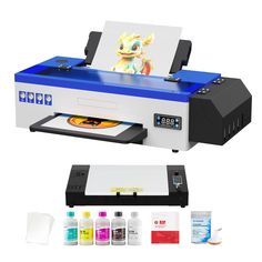 an image of a digital printer with ink and other items surrounding it on a white background