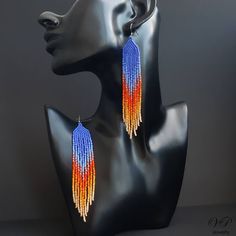 Colorful long seed beaded earrings, boho beaded earrings, shoulder dusters Orange Beaded Fringe Jewelry For Festival, Orange Beaded Fringe Dangle Earrings, Orange Fringe Beaded Earrings As Gift, Orange Beaded Fringe Drop Earrings, Orange Beaded Fringe Earrings As Gift, Orange Fringe Beaded Earrings For Gift, Orange Bohemian Tassel Earrings With Dangling Beads, Bohemian Orange Beaded Dangle Earrings, Orange Bohemian Jewelry With Beaded Fringe