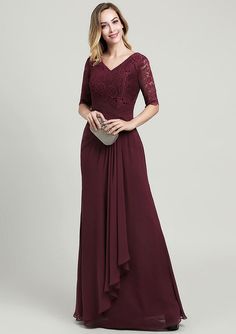 a woman in a long burgundy dress