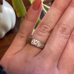 "This gorgeous tapered 6mm-3mm tapered Mokume Gane ring is shown in the Woodgrain pattern and the Smoke metal combination. It also features a Cathedral set diamond, a low-dome profile, and an unetched finish. The Smoke palette features 14k White Gold, Palladium and Sterling Silver. This modern take on a traditional classic is timeless and unique! *Price does NOT include stones or setting fees* Mokume Gane Cathedral Setting Palette: Smoke Pattern: Twist Width: 6mm- 3mm tapered Finish: Unetched Pr Heirloom Rings With Tension Setting, Fine Jewelry Engraved White Gold Ring With Bezel Setting, Polished Finish Diamond Engraved Round Ring, Diamond White Jewelry With Polished Round Band, Formal Jewelry With Tension Setting And Classic Cut, Formal Jewelry With Tension Setting In Classic Cut, Formal Classic Cut Jewelry With Tension Setting, Platinum Jewelry With Tension Setting, Round Cut, Anniversary Ring With Tension Setting And Round Stone