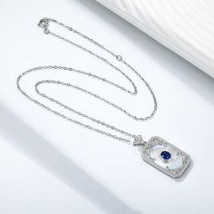 Overview: 100% new design and high quality Must-have for fashion women Have a beautiful appearance Specifications: Material: silver Material purity: 925 silver Style: Pendant Processing technology: jewel setting Modeling: geometric Chain sub style: o-chain Multilayer: No Pendant material: s925 silver Main stone: about 4 * 5mm, 0.55ct Perimeter: 41cm (inclusive) - 50cm (inclusive) Size: Pendant with buckle about 31 * 15mm, chain length 40+5cm Color: platinum gold Package Content: 1 x necklace Party Necklace, Motif Vintage, Square Pendant, Silver Style, Sapphire Necklace, Shell Pendant, Pendant Design, Natural Sapphire, 925 Jewelry