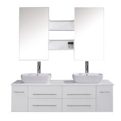 two white sinks and mirrors in a bathroom