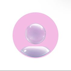 a pink circle with two bubbles in it