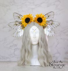 A real must-have statement crown for all fairies!  A beautiful sunflower yellow Harvest/Autumn flower fairy headdress. The large wings are made of acetate and glaze, and are very lightweight. They are backed with wire, which is what gives them their gorgeous curve. They are flexible to touch, and may be very slightly adjusted to give a deeper/more shallow curve. The headdress is decorated with sunflowers and multi yellow/ochre blossoms. Sparkling Swarovski beads hang over the forehead from a sil Fairy Yellow Dresses, Elf Crown Bee, Ren Faire Headdress, Sunflower Bridal Crown, Cheap Whimsical Halloween Costume Hats And Headpieces, Gold Feather Fairy Costume, Fae Costume Fairy Queen, Bee Women Costume, Elf Crown Yellow