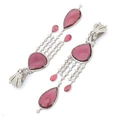 This is part of Chairish’s Fine Jewelry assortment.  Ruby Dangle earrings to make a statement with your look. These earrings create a sparkling, luxurious look featuring mixed cut gemstone. If you love to gravitate towards unique styles, this piece of jewelry is perfect for you.  PRODUCT DETAILS :-  > Material - 18K Solid white Gold > Gemstone - Ruby  > Gemstone Weight - 50.5 ct > Gemstone Shape - Mix  > Gemstone Pcs - 8 > Gemstone Size - Mix  > Diamond Weight - 4.9 ct > Diamond Size - 2.5, 1.5 Ruby Drop Earrings, Earrings To Make, Shell Chandelier, Diamond Chandelier Earrings, Long Chandelier, Silver Chandelier Earrings, Gold Chandelier Earrings, Art Deco Chandelier, Sparkle Earrings