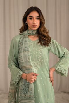 Brand: SaharProduct Code: S24-TL-L1-04Collection: Mirage by Sahar Unstitched Spring Summer CollectionFabric: Lawn DESIGN DETAILS: Embroidered Front Panel on Fancy Slub Lawn Fancy Slub Lawn Back Panel Embroidered Sleeves Digital Printed Silk Dupatta 2.5M. Dyed Cambric Trouser 2 M. DISCLAIMER:* Lining, Laces, and Tassels are not included in unstitched variants.* Embellishment items in stitched outfits are subject to market availability.* Product color may vary due to photographic lighting or your device settings. CARE INSTRUCTIONS: Extra Fabric Has Been Used For Shoot Original Color May Vary Slightly From The Picture Dry Clean Recommended Iron The Clothes At Moderate Temperature Do Not Use Bleach, Or Stain Removing Chemicals Damp Fabric Should Not Be Exposed To Sunlight Mirage by Sahar Unsti Luxury Naqshi Lawn Suit For Eid, Luxury Semi-stitched Cotton Salwar Kameez, Luxury Fitted Jamawar Lawn Suit, Luxury Embroidered Slub Silk Dress, Luxury Green Lawn Suit With Naqshi Detailing, Luxury Green Tissue Silk Lawn Suit, Luxury Festive Lawn Suit With Straight Kurta, Luxury Tissue Silk Lawn Suit For Eid, Luxury Lawn Suit For Eid And Traditional Ceremonies