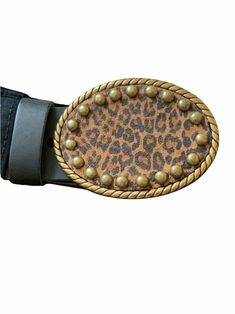 A Cheetah leather belt buckle with decorative accents is a stylish choice! The printed cheetah leather is accented with a little bling using decorative square metal spots. The oval rope buckle is easy to add to your favorite belt. Dress up your outfit with a unique handmade buckle when your look needs a little extra something. The buckle can be paired with many of Brooklyn Buckles interchangeable snap belts. This listing is for a buckle only but the belt can be purchased for an additional cost. Western Cowgirl Style, Cowboy Buckle, Leather Belt Buckle, Handmade Leather Belt, Western Belt Buckles, Silver Belt Buckle, White Plains, Beautiful Belts, Belt Dress