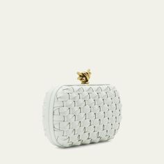 Bottega Veneta minaudiere in woven leather  Framed top with knot lift-clasp closure  Approx. 7.5"H x 4.5"W x 2"D Made in Italy Rectangular Clutch With Intrecciato Weave For Evening, Designer Evening Clutch With Intrecciato Weave, Evening Clutch With Intrecciato Weave, Designer Woven Leather Clutch For Evening, Luxury Evening Clutch With Intrecciato Weave, Elegant Woven Leather Evening Clutch, Rectangular Intrecciato Weave Clutch For Evening, Elegant Woven Leather Clutch For Evening, Elegant Evening Clutch With Woven Leather