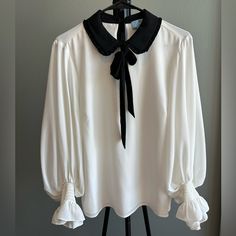 Worn One Time, So It’s New Without Tags And In Perfect Condition! Beautiful Top! Long Sleeve, Tie Neck, Bow Accents, Ivory. (The Last Photo Shows The Double Lining In The Front) Size Medium Elegant Tie Neck Blouse For Brunch, White Tie Neck Top For Party, Elegant White Blouse For Brunch, Ivory Blouse, Neck Bow, The Double, Tie Neck, One Time, Neck Tie