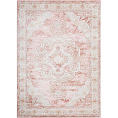 an antique style rug in pink and white with a large medallion design on the center