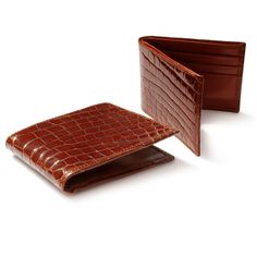 Tough, durable, and stylish! This cognac alligator wallet represents your style. Perfect compliment to our other mens accessories as well. Business Bifold Wallets With Crocodile Pattern, Luxury Cognac Bifold Wallet, Brown Business Wallets With Crocodile Pattern, Classic Wallet With Crocodile Pattern, Brown Crocodile Pattern Business Wallet, Formal Brown Wallet With Crocodile Pattern, Classic Leather Wallet With Crocodile Pattern, Formal Leather Wallets With Crocodile Pattern, Formal Crocodile Pattern Leather Wallets