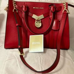 Beautiful Red Bag Bright Shiny Gold Hardware Purchased Brand New At Macy’s Tags On Real Leather Perfect Condition Only Used One Or Two Times Always Kept In Dust Bag Zipper Closure Shoulder Strap With Beautiful Gold Chains On Each End Can Be Used For Shoulder Or Cross. Body This One Is Called The Noubeau Hamilton#30f9g0hs3l Bright Red Large Satchel Real Leather Tags On Purchased At Macy’s For $358. This Bag Is Absolutely Gorgeous But A Bit Too Large For Me. I Am A Very Small Person Did Not Come W Red Travel Bags With Gold-tone Hardware, Designer Red Bag With Branded Hardware, Red Leather Bag With Gold-tone Hardware, Designer Red Bags With Branded Hardware, Designer Red Bags With Gold-tone Hardware, Michael Kors Red Shoulder Bag With Detachable Strap, Michael Kors Red Rectangular Shoulder Bag, Red Michael Kors Shoulder Bag With Detachable Strap, Michael Kors Red Bag For Everyday Use