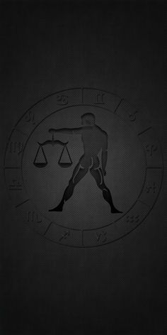 the silhouette of a man holding a scale of justice in front of a black background