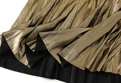 Strike the perfect balance between sophistication and practicality with the mid-length design. Ideal for both spring and autumn, this skirt offers elegance without compromising on comfort, allowing you to move with grace. Fabric name: Polyester Skirt type: pleated skirt Color: black, gold, silver Main fabric composition: polyester (polyester fiber) size: one size Main fabric ingredient content: 95% and above Style Type: Temperament Commuting Skirt length: mid-length skirt Skirt category: skirt S Elegant Knee-length Bottoms With Folds, Elegant Stretch Full Mini Skirt, Elegant Spring Maxi Skirt With Pleated Hem, Elegant Full Mini Skirt For Spring, Elegant Gold Skirt For Fall, Elegant Gold Mini Skirt For Spring, Elegant Pleated Gold Skirt, Elegant Pleated Stretch Mini Skirt, Elegant Pleated Mini Skirt For Fall