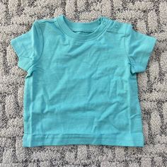 Primary Brand Baby Tee In “Pool” Color, Brand New In Bag. Baby Size 3-6 Months. Basic Short Sleeve T-shirt For Playtime, Blue Short Sleeve Shirt For Playtime, Light Blue Short Sleeve T-shirt For Playtime, Playful Light Blue Tops For Playtime, Blue Short Sleeve Tops For Playtime, Cute Light Blue Tops For Playtime, Basic Short Sleeve Tops For Playwear, Playful Short Sleeve Top, Playful Short Sleeve Tops For Daycare