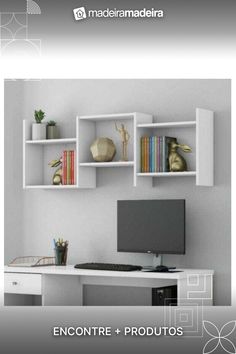 a desk with a computer monitor, keyboard and bookshelves on it in front of a white wall