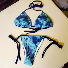 Bissommer Blue Camo String Bikini Sz Med New In Bag Blue Ocean Camo Colors Stunning String Bikini Soft Material Runs Small Definitely Good For Sun Bathing Blue Swimwear For Vacation, Blue Tie-side Bottom Swimwear For Pool, Blue Triangle Top Swimwear For Vacation, Blue Summer Swimwear For Vacation, Turquoise Tie-side Bottom Swimwear For Beach, Turquoise Halter Neck Swimwear For Summer, Blue Tropical Swimwear For Sunbathing, Light Blue Swimwear For Beach Season, Blue Triangle Top Swimwear For Summer