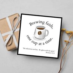 a card with the words brewing faith, one cup at a time and a gift wrapped in brown paper