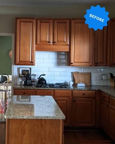 a kitchen with wooden cabinets and marble counter tops