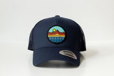 Mountains - Trucker Hat - Navy Blue 65/35 polyester/cotton Mesh back, structured Mid-profile, six-panel Snapback closure Summer Six-panel Hat One Size Fits Most, Navy Snapback Hat With Curved Brim For Outdoor, Navy Six-panel Outdoor Hat, Navy Curved Brim Hat For Outdoor, Navy Travel Cap, Blue Adjustable Snapback Hat For Everyday, Blue Six-panel Trucker Hat For Summer, Blue Summer Trucker Hat For Travel, Summer Trucker Hat In Blue For Travel