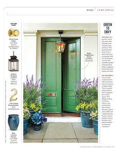 the front page of a magazine with green doors and potted plants on either side