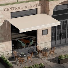 the outside of a restaurant with tables and chairs under an awning that reads central all - star