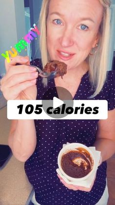 a woman holding a spoon with some food in her hand and the words 10 calories written on it