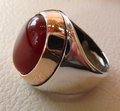 aqeeq red liver agate carnelian natural stone semi precious cabochon oval heavy man ring sterling silver bronze all sizes fast shipping Risk free Quality guarantee policy : If you are not satisfied with your item for any reason simply send it to us and you will get a replacement or refund . please write or choose your size with the order and we will size it for you . Our ring is handcrafted mostly with a few simple tools . but some methods are used in casting like lost wax method . sterling silv Classic Carnelian Round Signet Ring, Classic Round Carnelian Signet Ring, Elegant Round Carnelian Signet Ring, Anniversary Carnelian Signet Ring With Polished Finish, Silver Carnelian Cabochon Jewelry, Classic Agate Jewelry With Polished Finish, Formal Silver Carnelian Jewelry, Red Carnelian Signet Ring With Polished Finish, Polished Oval Carnelian Jewelry