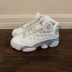 Air Jordan 13 Retro Wolf Grey Kids Shoes Size 11c Dj3005-160 White Synthetic Jordan Shoes With Rubber Sole, White Basketball Shoes With Rubber Sole, White High-top Jordan Shoes With Rubber Sole, White Jordan Shoes For Sports With Round Toe, White Jordan Shoes With Branded Insole, White Synthetic Jordan Shoes With Boost Midsole, White Synthetic Basketball Shoes With Round Toe, White Mid-top Jordan Shoes With Cushioned Footbed, White Synthetic Round Toe Basketball Shoes