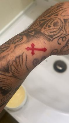 Wrist Red Cross Tattoo Red Cross Tattoo, Calf Sleeve Tattoo, Cloud Tattoo Sleeve, Arm Tattoos For Guys Forearm, Tattoo Red, Money Tattoo, Cross Tattoo For Men, Clever Tattoos, Wrist Tattoos For Guys