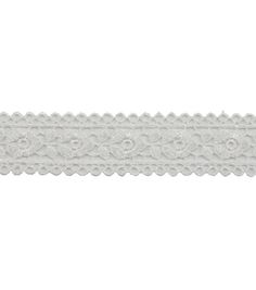 a white lace ribbon on a white background