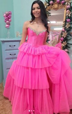 Pageant Gown With Ruffles And Fitted Bodice, Organza Ball Gown With Ruffles For Quinceanera, Sleeveless Ruffled Ball Gown For Quinceanera, Strapless Ruffle Dress For Quinceanera, Sleeveless Ruffled Gown For Quinceanera, Ruffled Dresses For Debutante Ball And Prom Season, Sleeveless Gown With Ruffles For Quinceanera, Organza Ball Gown Evening Dress With Ruffles, Floor-length Organza Ball Gown With Ruffles