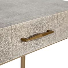 a close up of a table with a drawer on it's side and an object in the middle