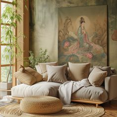 a living room filled with lots of pillows and furniture next to a painting on the wall