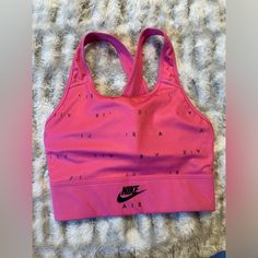 No Flaws Almost Brand New Pink Letter Print Activewear For Sports, Casual Pink Sports Bra For Light Activities, Casual Pink Sports Bra For Exercise, Casual Pink Sports Bra, Nike Pink Sports Bra For Light Sports, Nike Pink Casual Sports Bra, Pink Letter Print Activewear For Gym, Nike Sports Bra For Spring Sports, Casual Pink Nike Sports Bra