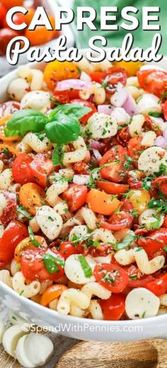 a bowl filled with caprese pasta salad