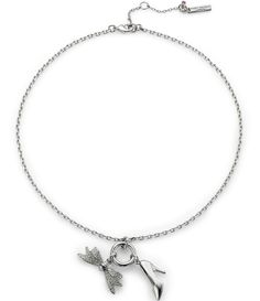 From Kurt Geiger London&#x2C; this necklace features:Short pendant necklaceBrass/glass crystalLobster claw closureFeaturing signature eagle motif flowy bow and high-heel charm pendants adorned with sparkly pavApprox. 16" L + 2" extenderIncludes Kurt Geiger London pouchImported. 2000s Jewelry, Short Pendant Necklace, Rhinestone Bow, Bow Shoes, Rhinestone Jewelry, Accessories Jewelry Necklace, Kurt Geiger, Shoe Charms, Crystal Rhinestone