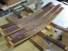 several pieces of wood sitting on top of a table