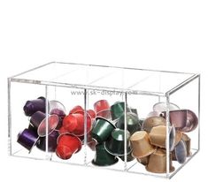 an acrylic container filled with different colored cups